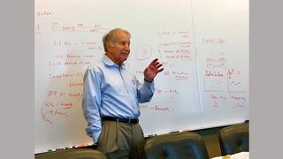 Photo of Haig Kazazian during a Johns Hopkins Department of Genetic Medicine faculty meeting.